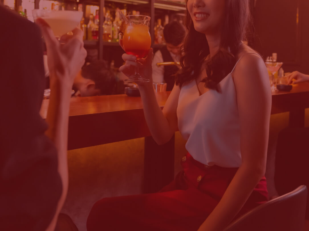 Woman talking at a bar/ overlay with red color